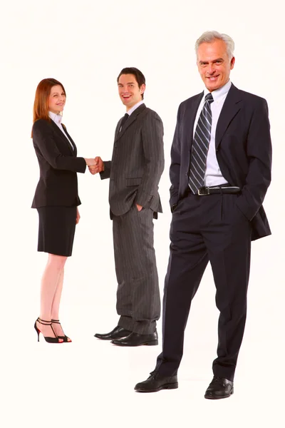 Dois homens de negócios e uma mulher de negócios — Fotografia de Stock