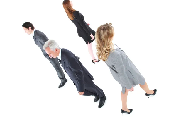 Businessman and businesswoman walking in different directions — Stock Photo, Image