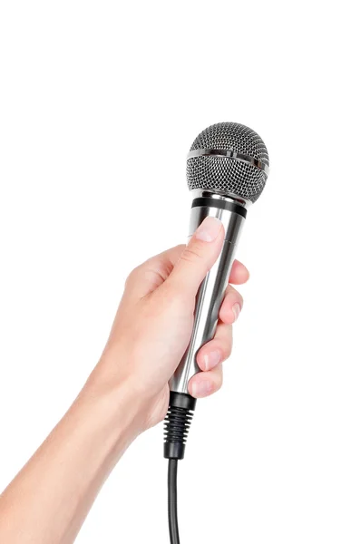 Käsi mikrofonilla — kuvapankkivalokuva