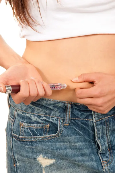 Diabetes dependent woman making human insulin shot — Stock Photo, Image