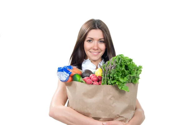 Žena drží nákupní taškou plnou vegetariánské potraviny — Stock fotografie