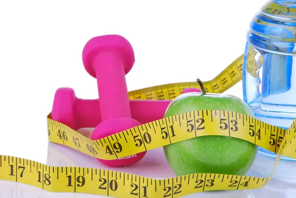 Diet diabetes concept with tape measure organic green apple — Stock Photo, Image