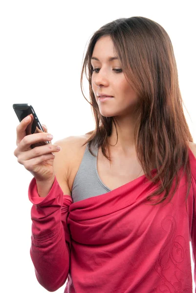 Pretty woman reading, typing and sending SMS text message on mob — Stock Photo, Image