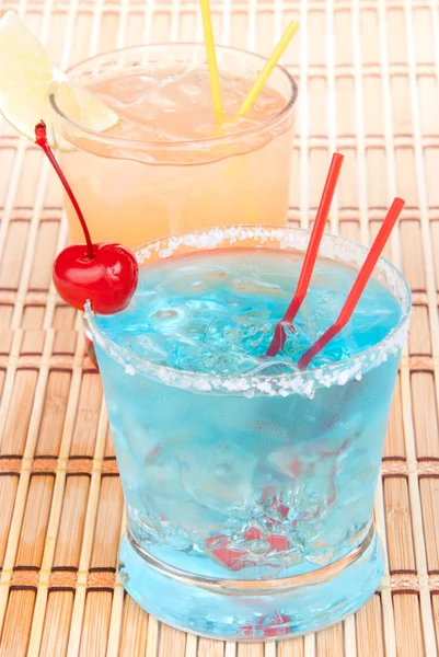 Blue margarita cocktail, Long island iced tea and tequila sunris — Stock Photo, Image