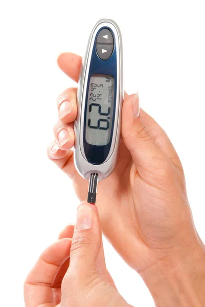 Diabetic measuring glucose level blood test using ultra mini glu — Stock Photo, Image