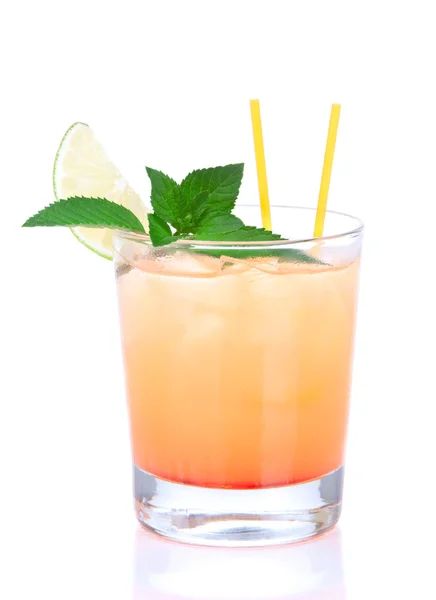 Alcohol tequila sunrise cocktail with crushed ice, green mint — Stock Photo, Image