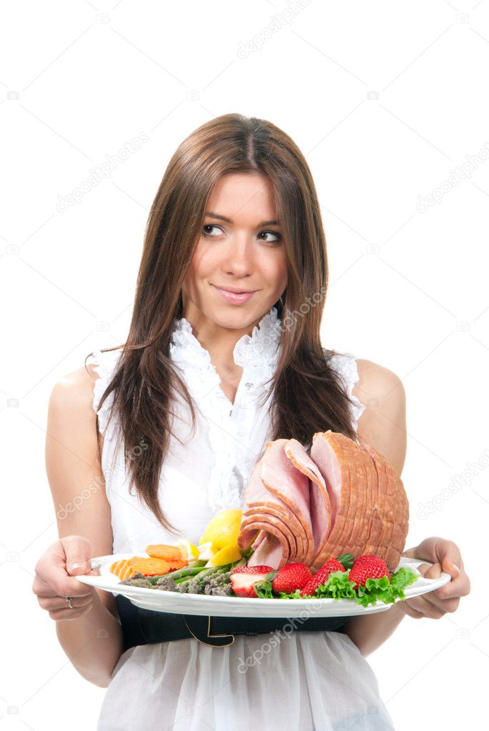 Woman hold plate delicious whole baked honey sliced ham