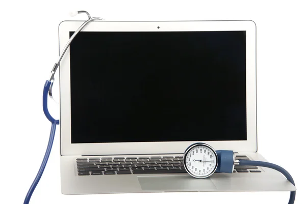 Moderní populární laptop pc doktor lékařských stethoscop — Stock fotografie
