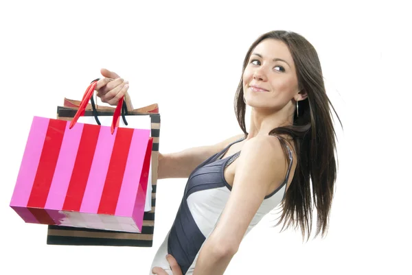 Pretty woman with colorful shopping bags — Stok fotoğraf