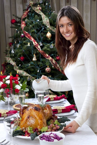 stock image Woman christmas dinner roasted turkey