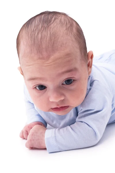Güzel bebek çocuk yerde beyaz bir arka planda tarama. — Stok fotoğraf