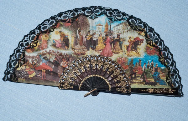 Decorative fan on a wall — Stock Photo, Image