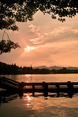 Sunset landscape of China West Lake clipart