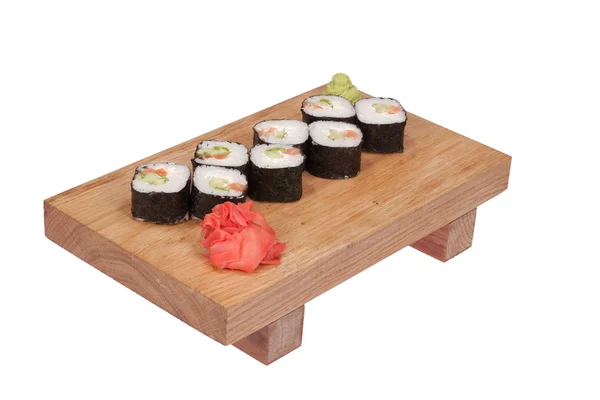 Sushi rolls on wood stand — Stock Photo, Image