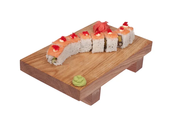 stock image Sushi rolls on wood stand