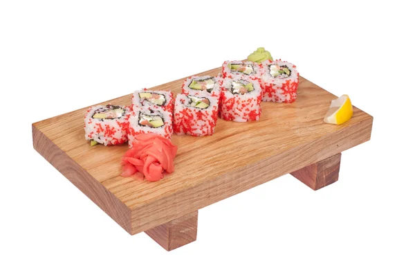 Sushi rolky na dřevo stojan — Stock fotografie