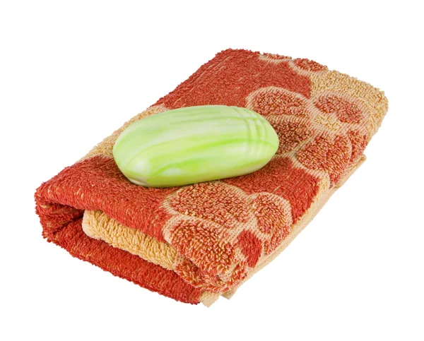 Soap lies on a towel — Stock Photo, Image