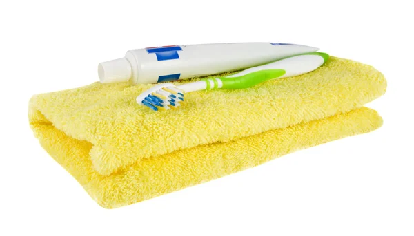 Cepillo de dientes, pasta y toalla — Foto de Stock