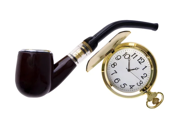 Un reloj es de bolsillo y tubo de fumar — Foto de Stock