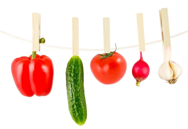 Vegetables hanging on a clothesline — Stock Photo, Image