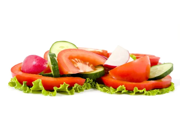 Sallad från grönsaker på en vit bakgrund — Stockfoto