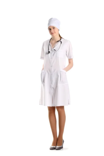 Dottore con stetoscopio in posa sullo sfondo bianco — Foto Stock