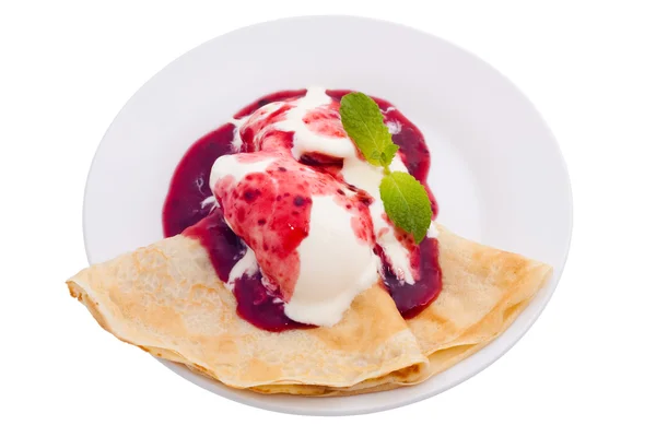 Crepe with ice cream and berry topping