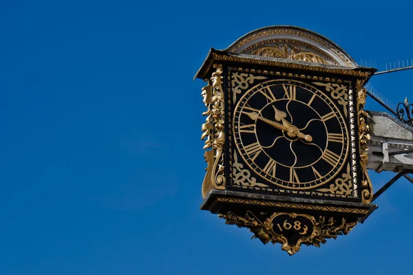 stock image Ancient Clock Over A Blue Sky