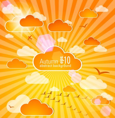 Abstract autumn sky with clouds and sun clipart