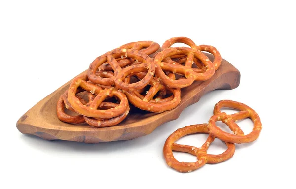 A wooden bowl of salted pretzels — Stock Photo, Image