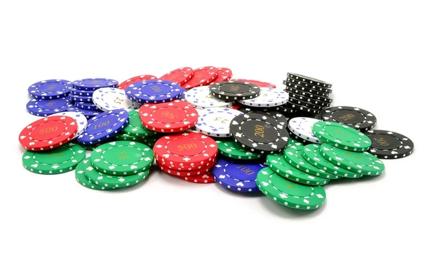 Une pile de jetons de poker dispersés — Photo