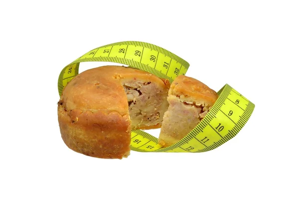 Pork pie & measuring tape — Stock Photo, Image