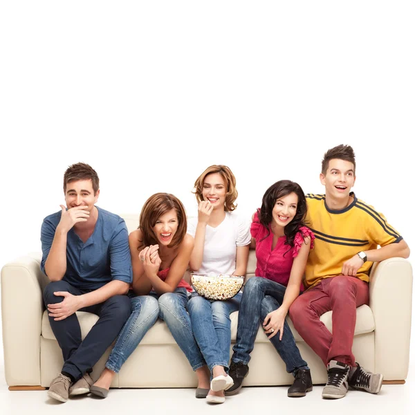 Laughing hard amusing couch friends - Stock Image. 