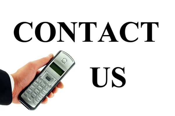 Contacte-nos Conceito com telefone sem fio na mão isolado em branco — Fotografia de Stock