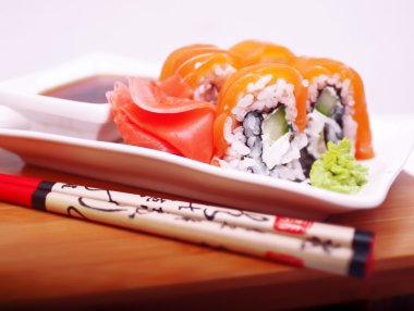 Philadelphia salmon sushi on plate clipart