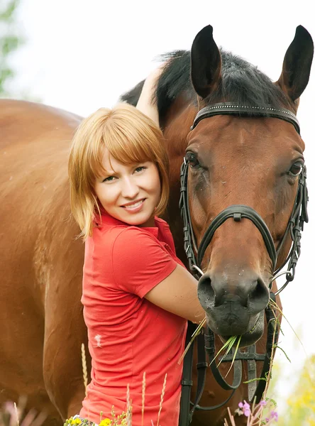 Portrait of young girl with horse — Stock Photo, Image