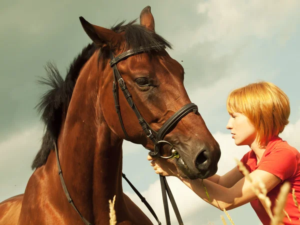 Portrait of young girl with horse — Stock Photo, Image