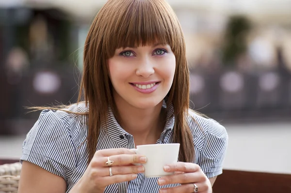 Woman alone in a cafe — Stock Photo, Image