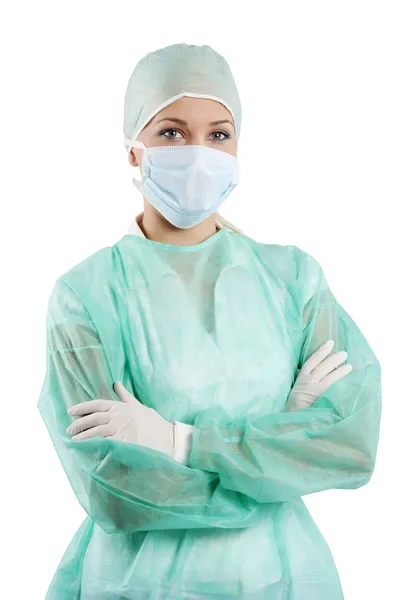 Jeune infirmière posant avec masque — Photo