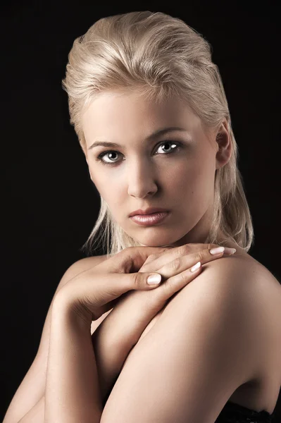 Blond cute woman over black — Stock Photo, Image