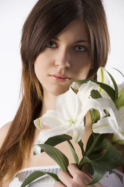 Красавица с лилией — стоковое фото