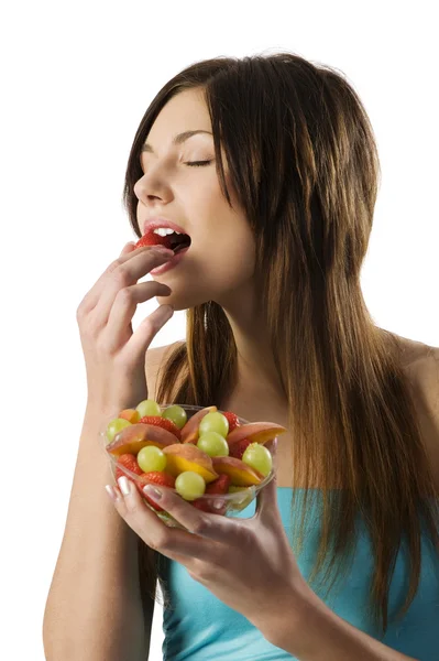 Menina comendo frutas — Fotografia de Stock