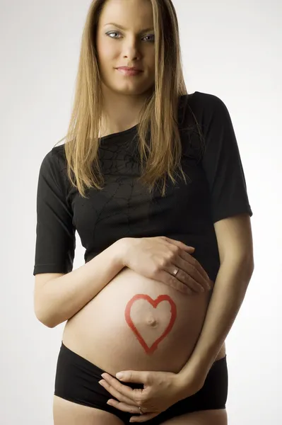 O coração da grávida — Fotografia de Stock