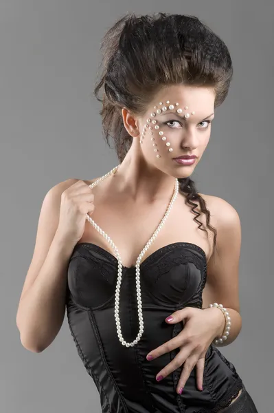 Woman in black corset — Stock Photo, Image