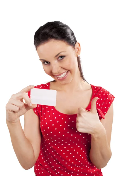 Woman in red with card smiling — Stock Photo, Image