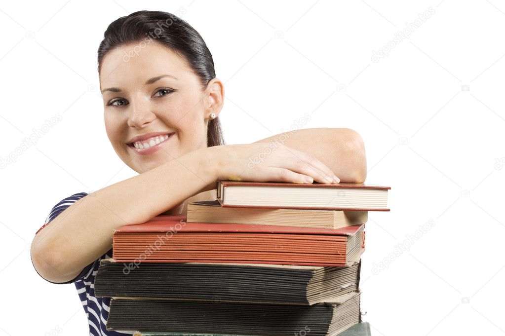 Student smiling over book
