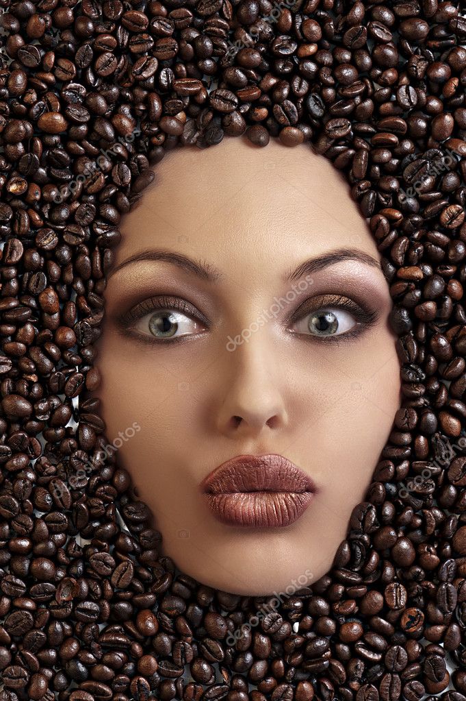 Portrait of a pretty girl laying among coffee beans — Stock Photo ...