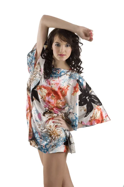Ung kvinna i färg klänning — Stockfoto