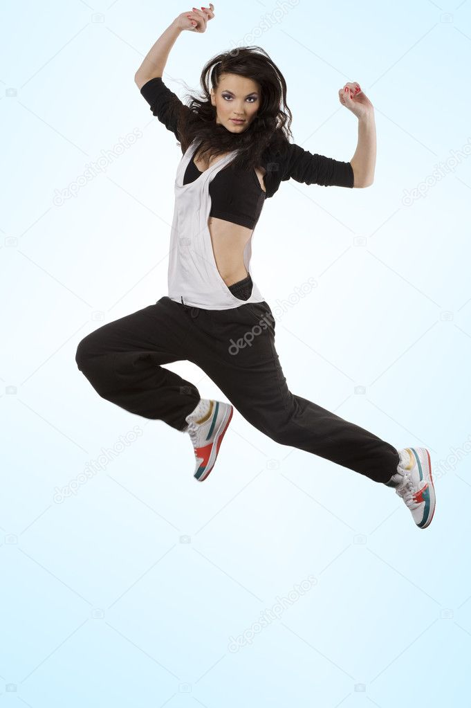 Stunning girl dancer jumping