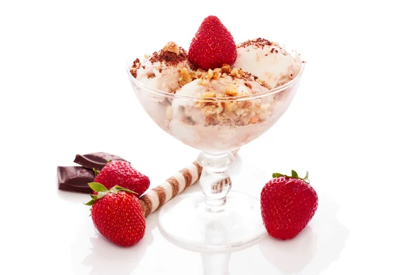 Ice cream with nuts and strawberry — Stock Photo, Image